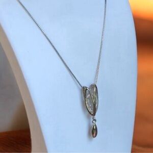 Silver Tone Necklace with Unique Pendant Charm